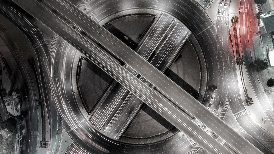 Arial view of highway with round on / off ramps
