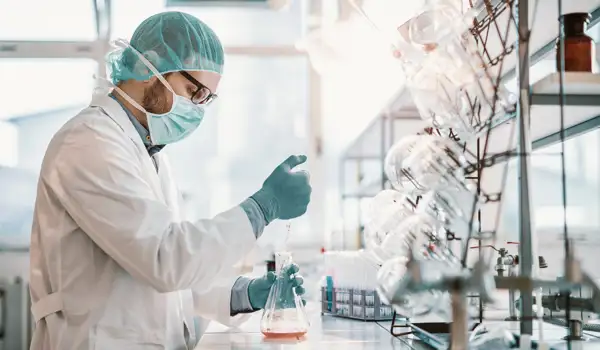 Man in a lab testing something