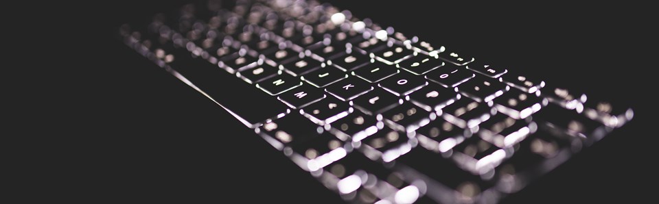 cybersecurity, white lit keyboard 