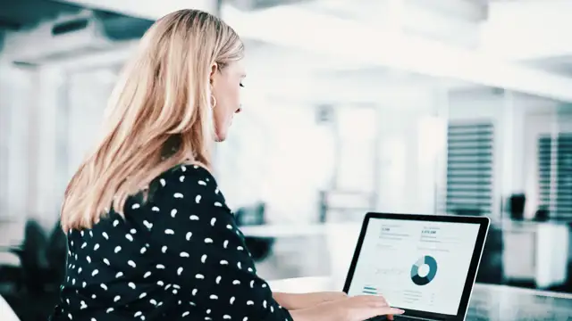 Woman preparing a presentation on a computer