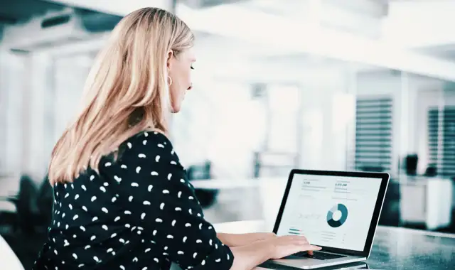 Woman preparing a presentation on a computer