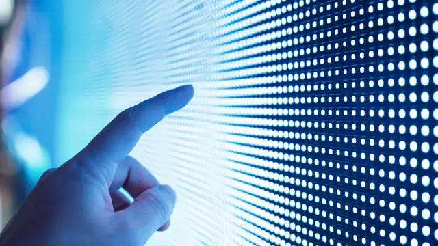 Finger interacting with technology