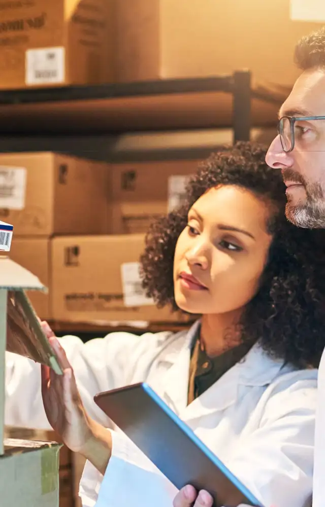 Man and woman in a packaging room