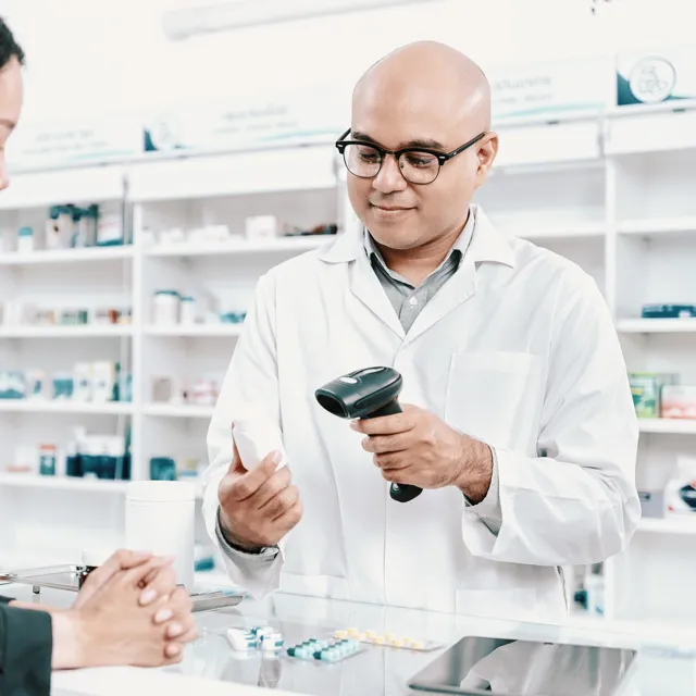 Woman buying something in a pharmacy