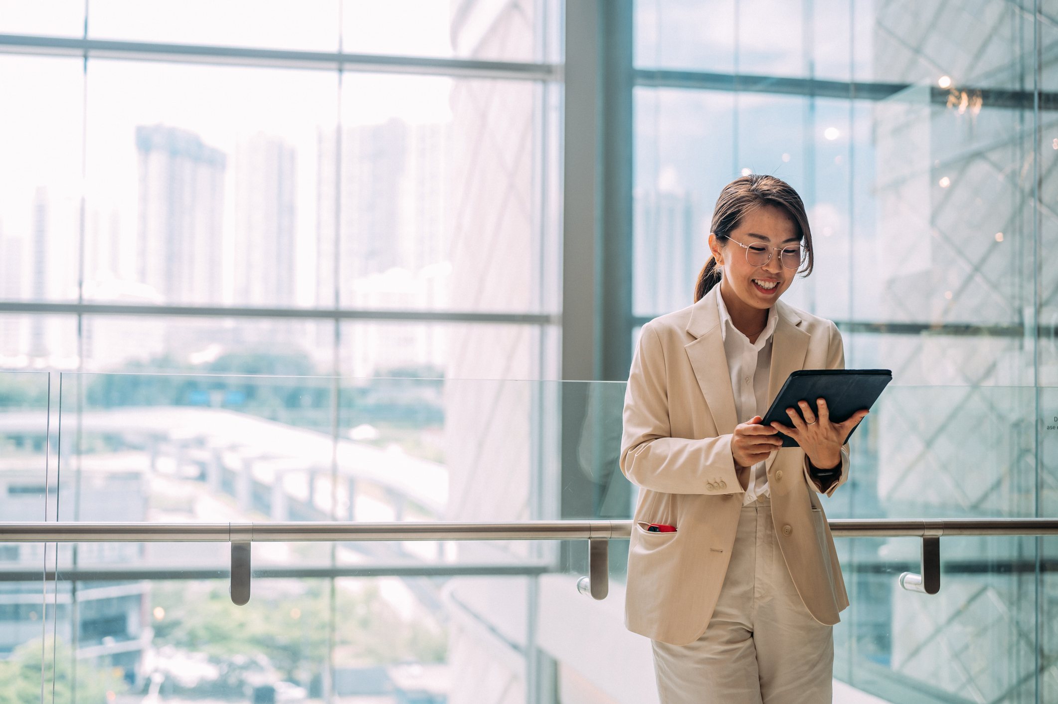 Business consultant using a tablet to support digital transformation, enterprise IT strategy and technology innovation.